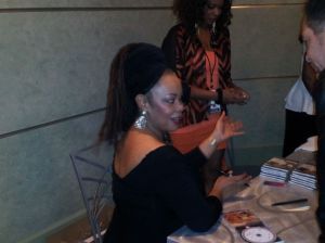 Karen Briggs talking to a fan.